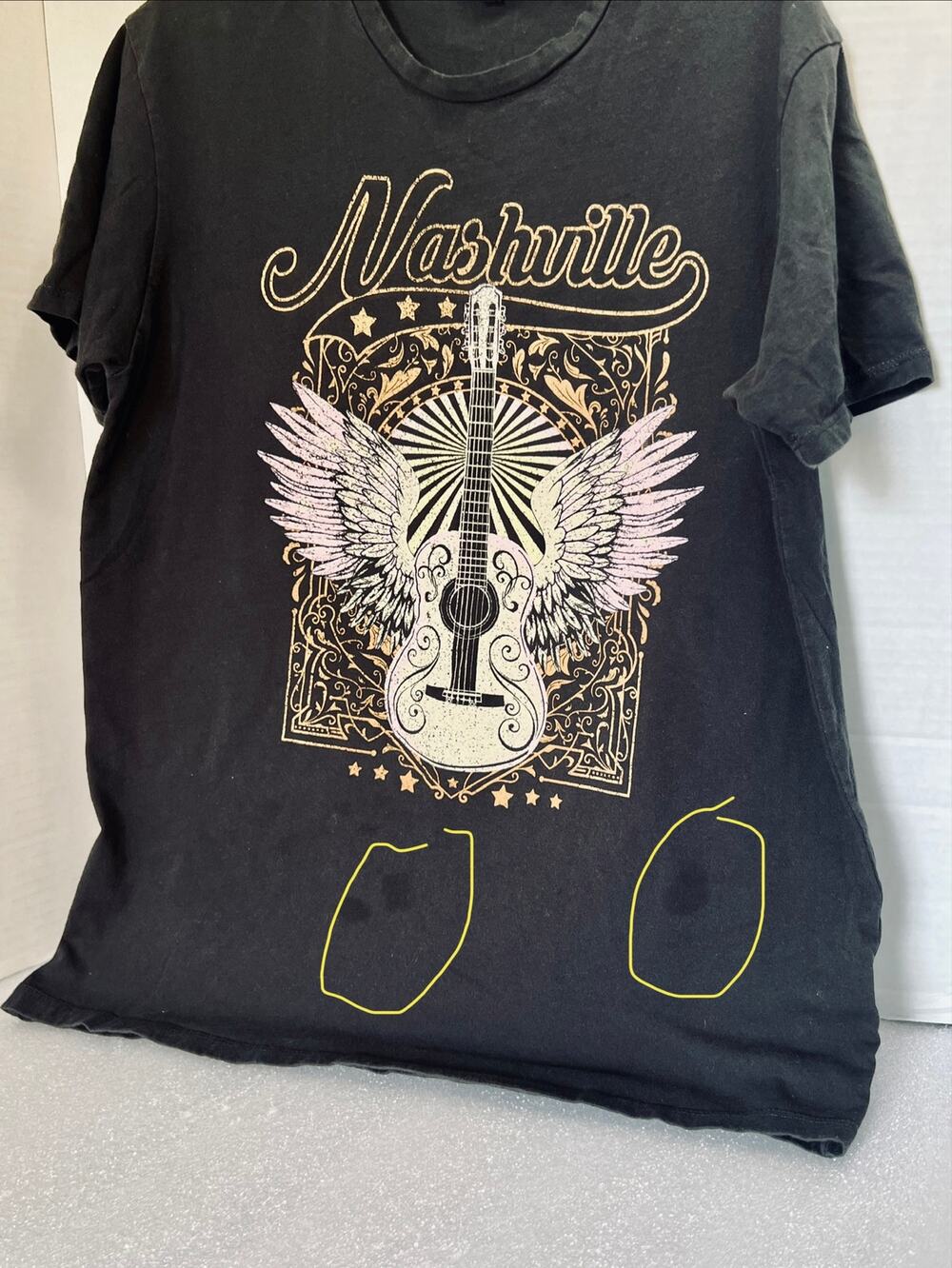 Nashville Tee.  Size Small with Guitar graphic.  Black. Couple small spots.